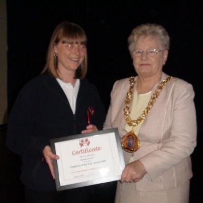 Joanna Getting Her Employee Of The Year Award